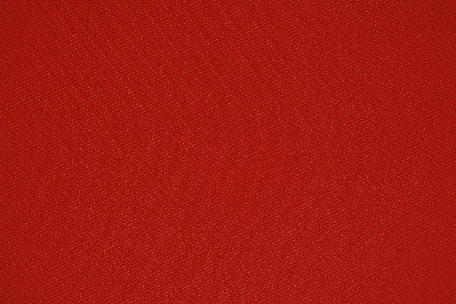 Close-up texture of premium red exhibition carpet